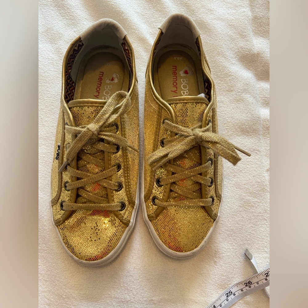 Sketchers Tennis Shoe with memory foam 
8 1/2 W gold sparkle, Bobs model